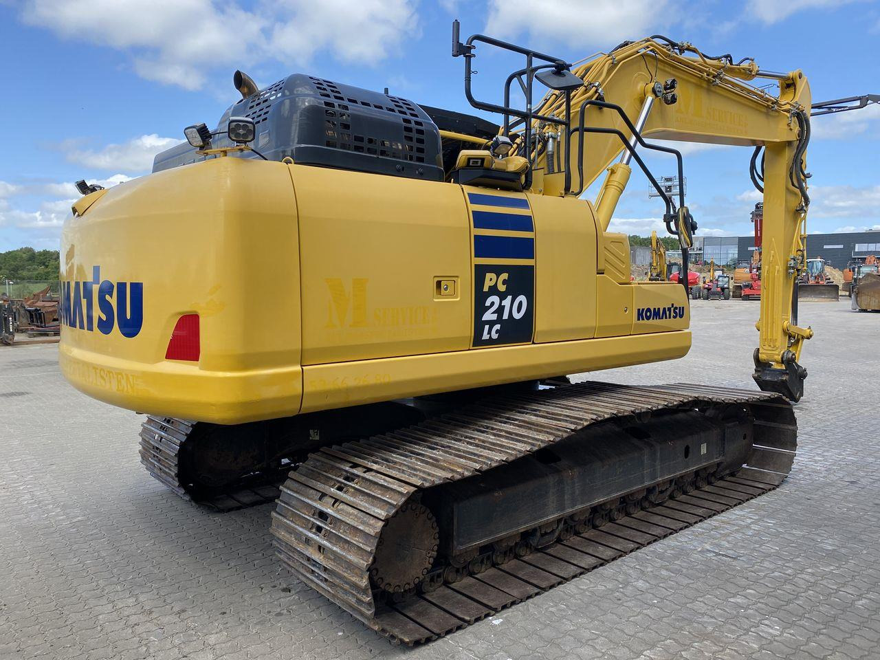 Beltegraver Komatsu PC210LC-11