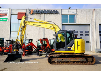 Beltegraver NEW HOLLAND