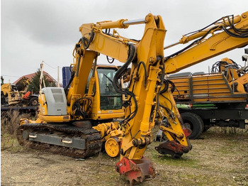 Beltegraver NEW HOLLAND