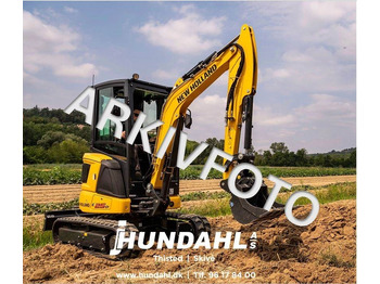 Beltegraver NEW HOLLAND