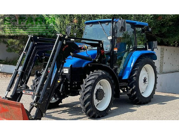 Traktor New Holland tl100 (4wd): bilde 4 Traktor New Holland tl100 (4wd): bilde 4