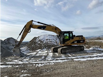 Beltegraver CATERPILLAR 323DL