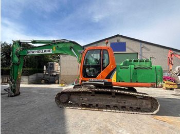 Beltegraver NEW HOLLAND