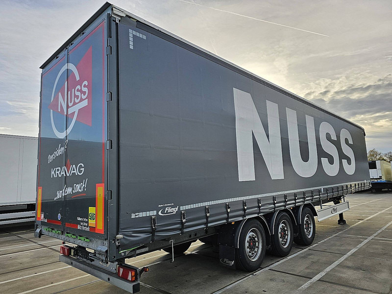 Fliegl SCHUIFZ COIL - Gardintrailer: bilde 2 Fliegl SCHUIFZ COIL - Gardintrailer: bilde 2