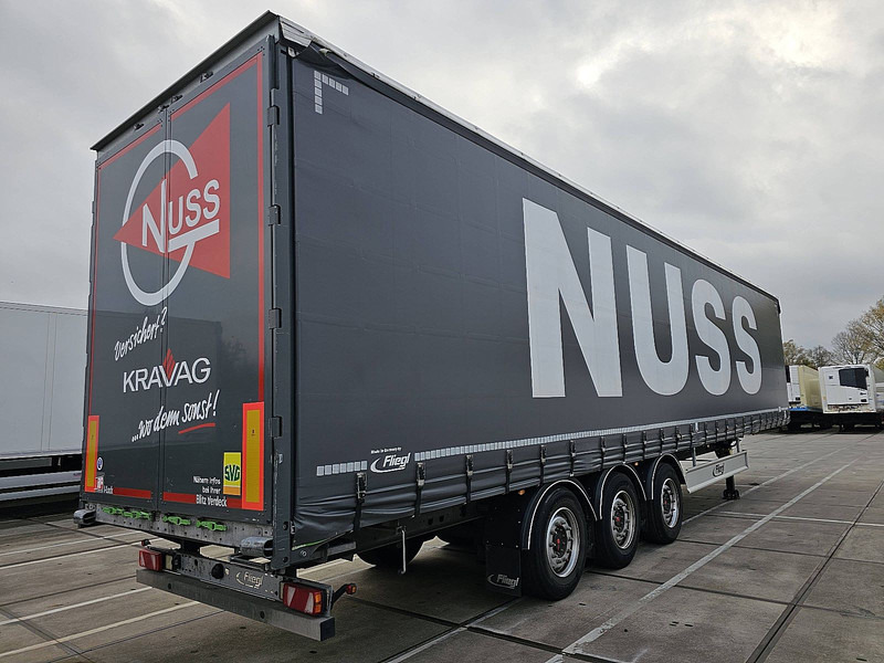 Fliegl SCHUIFZ COIL - Gardintrailer: bilde 2 Fliegl SCHUIFZ COIL - Gardintrailer: bilde 2