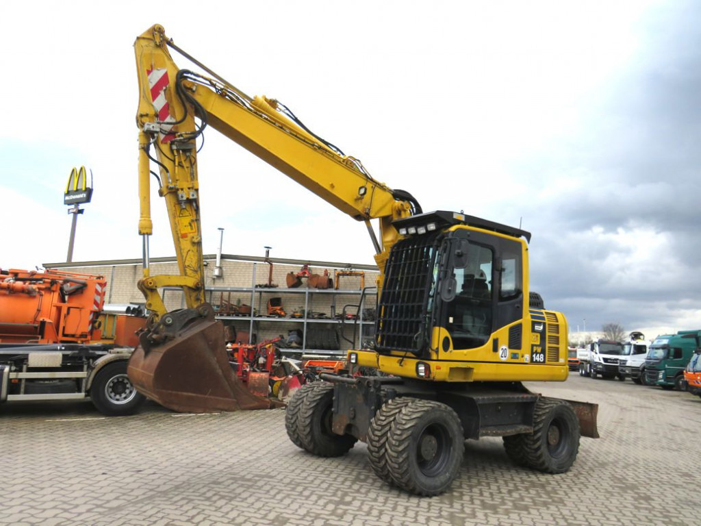 KOMATSU HANOMAG Mobilbagger PW 148 - 8 Bagger 6.824h Deutsch top - Hjulgraver: bilde 1 KOMATSU HANOMAG Mobilbagger PW 148 - 8 Bagger 6.824h Deutsch top - Hjulgraver: bilde 1