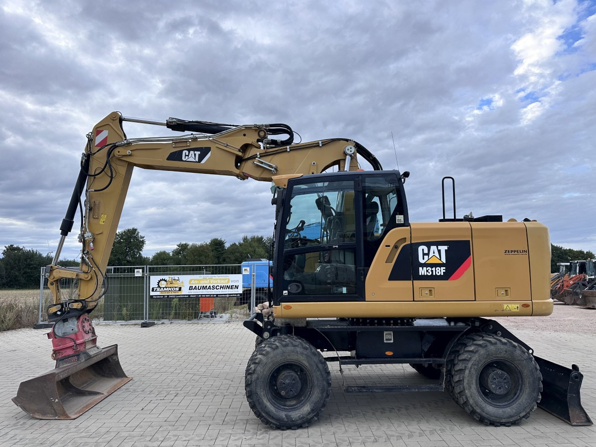 CATERPILLAR M 318 F Offset boom Deutsche Maschine Top ! - Hjulgraver: bilde 1 CATERPILLAR M 318 F Offset boom Deutsche Maschine Top ! - Hjulgraver: bilde 1