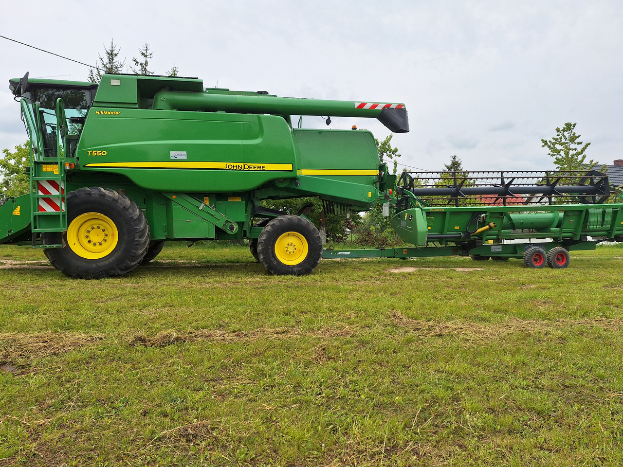 John Deere T550 - Skurtresker: bilde 1 John Deere T550 - Skurtresker: bilde 1