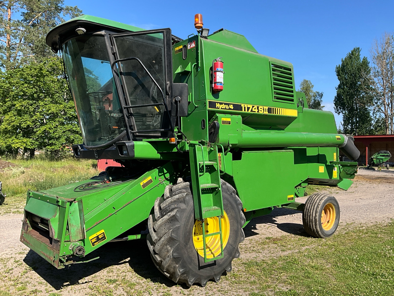 John Deere 1174 S2 Hydro4 - Skurtresker: bilde 1 John Deere 1174 S2 Hydro4 - Skurtresker: bilde 1