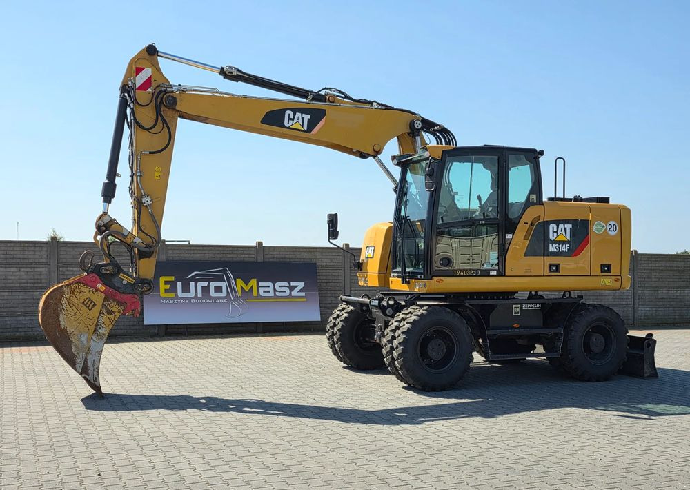 Caterpillar M314F, 2019 ROK, 3300 MTH, OIL QUICK OQ 65 - Hjulgraver: bilde 1 Caterpillar M314F, 2019 ROK, 3300 MTH, OIL QUICK OQ 65 - Hjulgraver: bilde 1