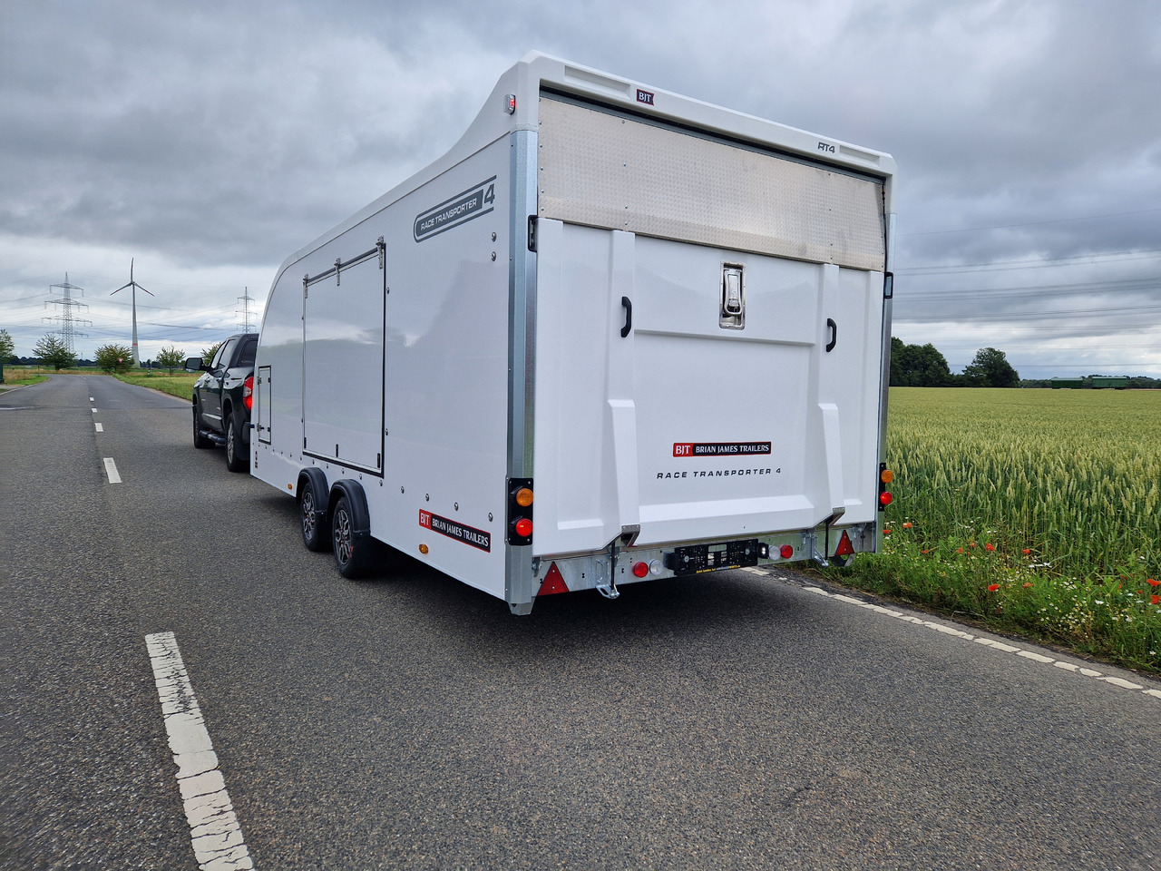 Transporter tilhenger BJT Race Transporter 4 550x212x188cm weiss E Winde Frontstauraum ASR Alufelgen dark 3500kg Modell 24: bilde 14