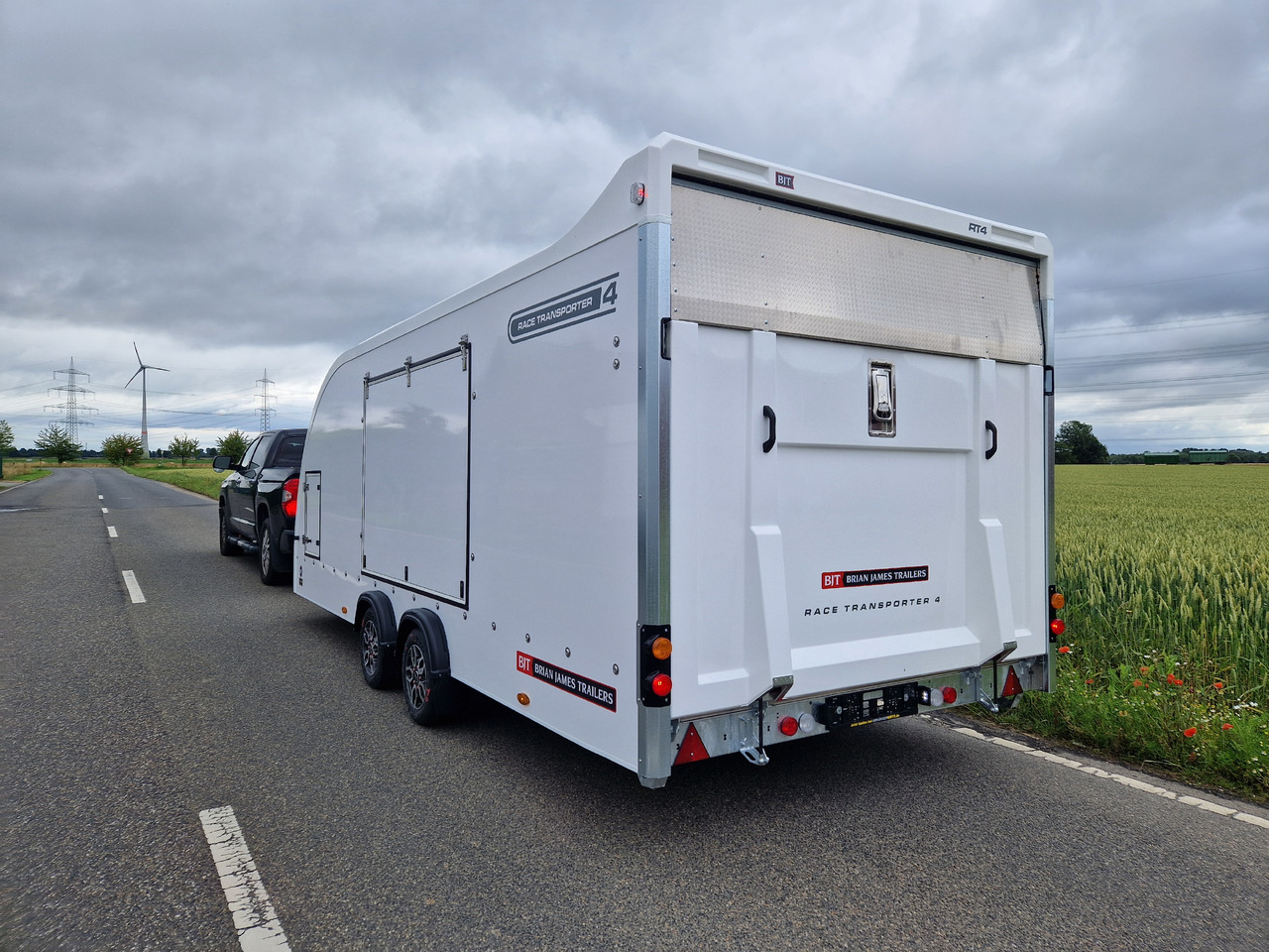 Transporter tilhenger BJT Race Transporter 4 550x212x188cm weiss E Winde Frontstauraum ASR Alufelgen dark 3500kg Modell 24: bilde 8