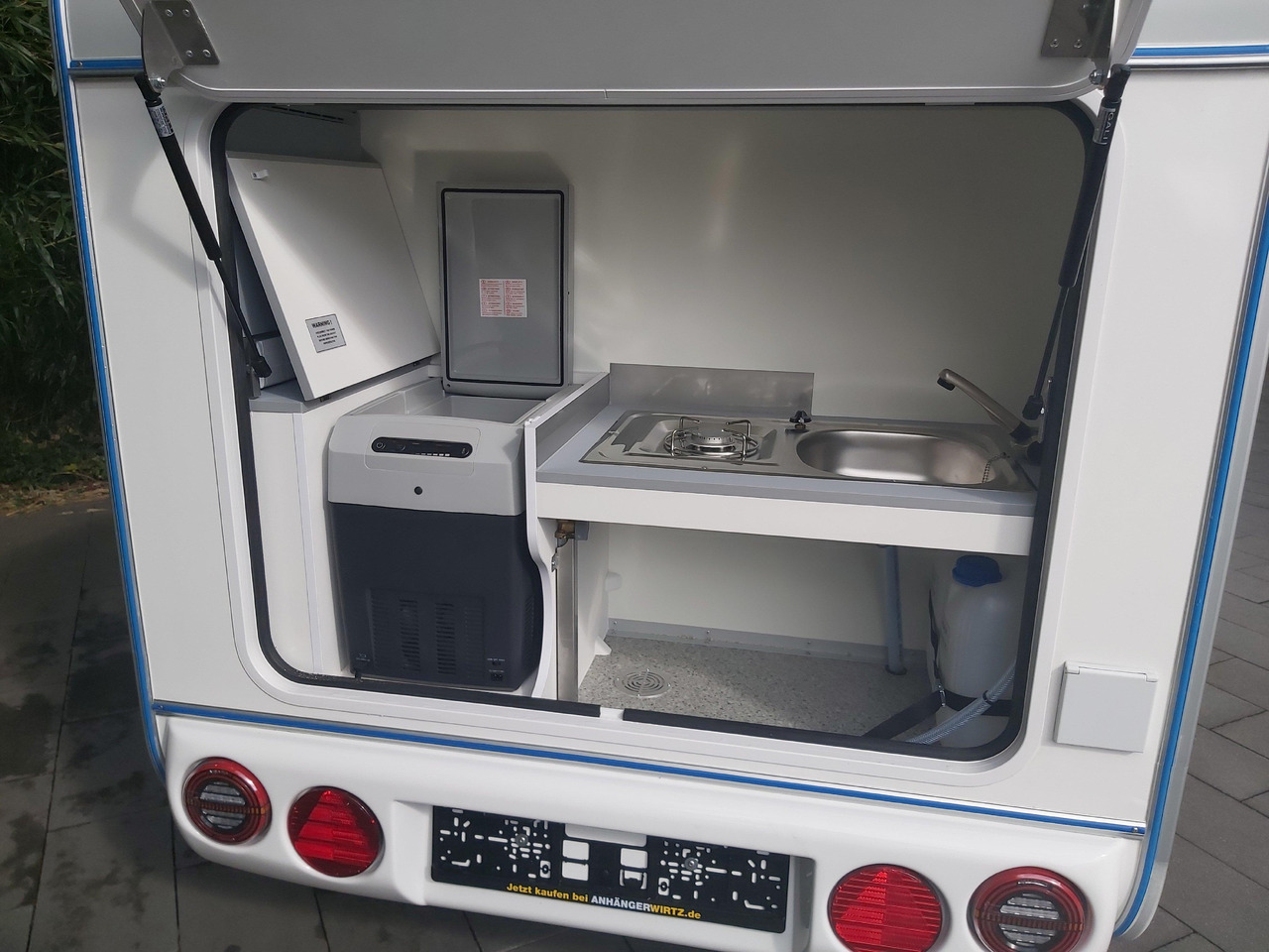 Campingvogn Mini Camper Mini Tommy TMC25 252x140x121cm aero V1 Küche 12V/230V 100km/H 750kg gebremst Modell 24: bilde 6 Campingvogn Mini Camper Mini Tommy TMC25 252x140x121cm aero V1 Küche 12V/230V 100km/H 750kg gebremst Modell 24: bilde 6