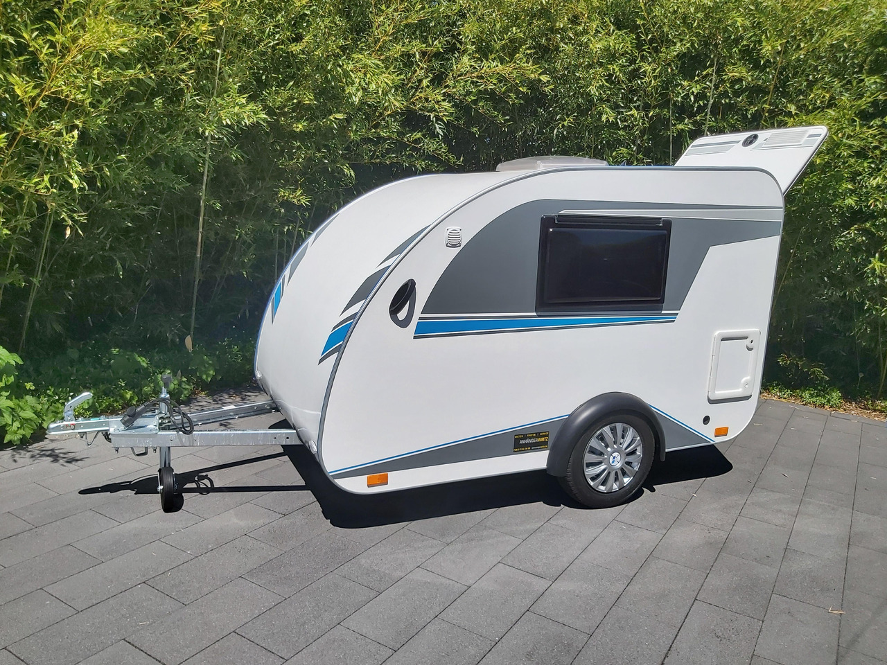Mini Camper Mini Tommy TMC25 Basic V1 252x140x121cm Küche 100km/H 750kg ohne Bremse Winter Aktion - Campingvogn: bilde 2 Mini Camper Mini Tommy TMC25 Basic V1 252x140x121cm Küche 100km/H 750kg ohne Bremse Winter Aktion - Campingvogn: bilde 2