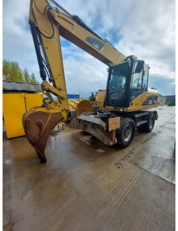 CAT M315D - Hjulgraver: bilde 1 CAT M315D - Hjulgraver: bilde 1