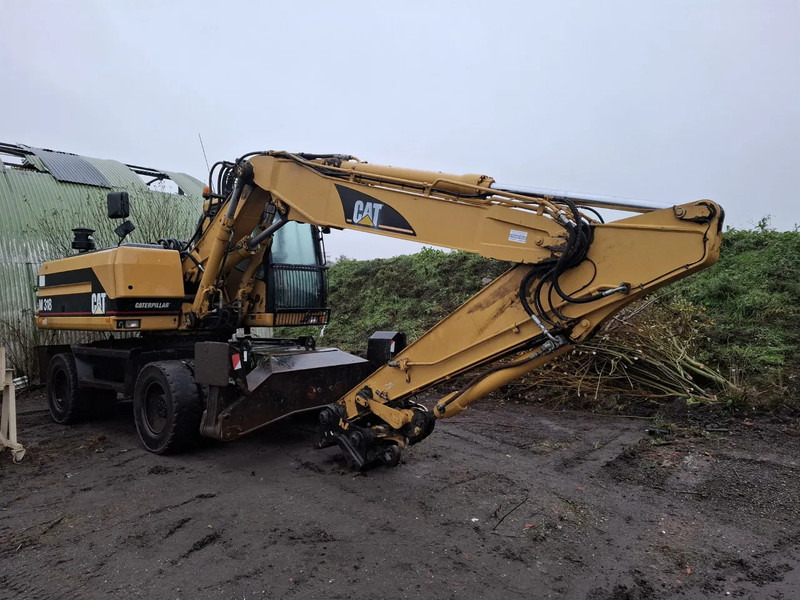 Caterpillar M318 - Hjulgraver: bilde 1 Caterpillar M318 - Hjulgraver: bilde 1