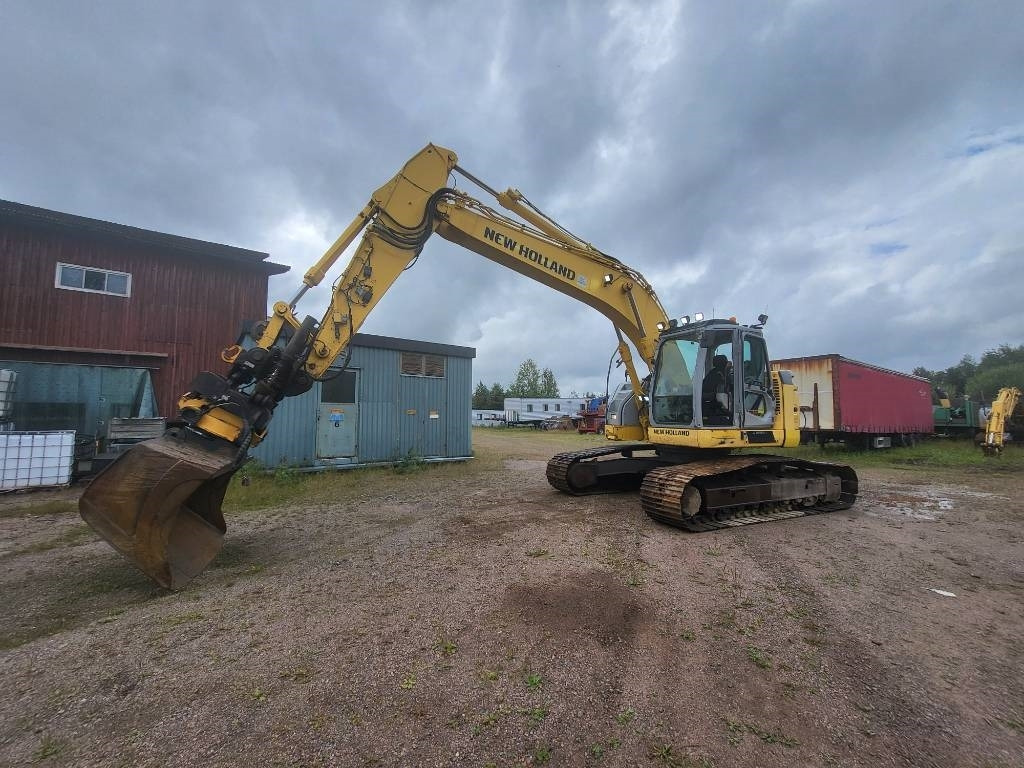New Holland Kobelco E 235 B SR-2 - Beltegraver: bilde 1 New Holland Kobelco E 235 B SR-2 - Beltegraver: bilde 1