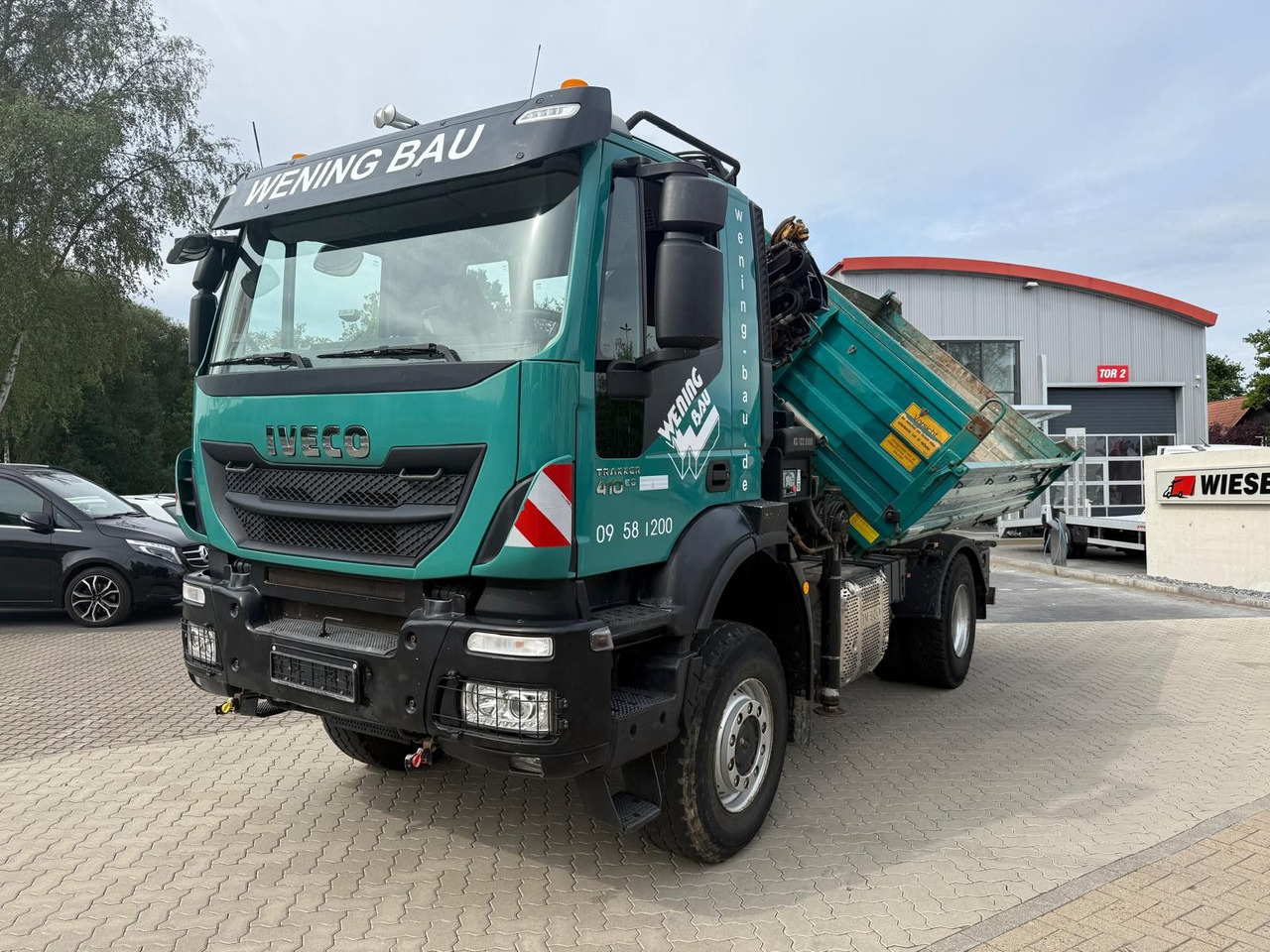 Iveco AD190 T/W Trakker 410 4x4 Allrad Kran KipperHIAB - Tippbil, Kranbil: bilde 1 Iveco AD190 T/W Trakker 410 4x4 Allrad Kran KipperHIAB - Tippbil, Kranbil: bilde 1