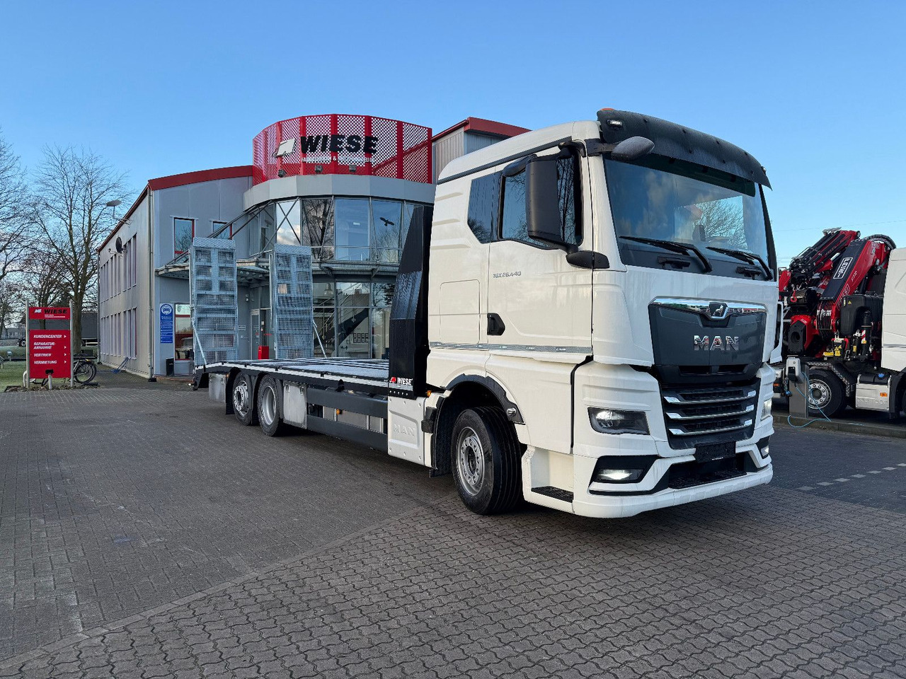 MAN Baumaschinen-  Arbeitsbühnentransporter Rampen - Transporter lastebil: bilde 2 MAN Baumaschinen-  Arbeitsbühnentransporter Rampen - Transporter lastebil: bilde 2