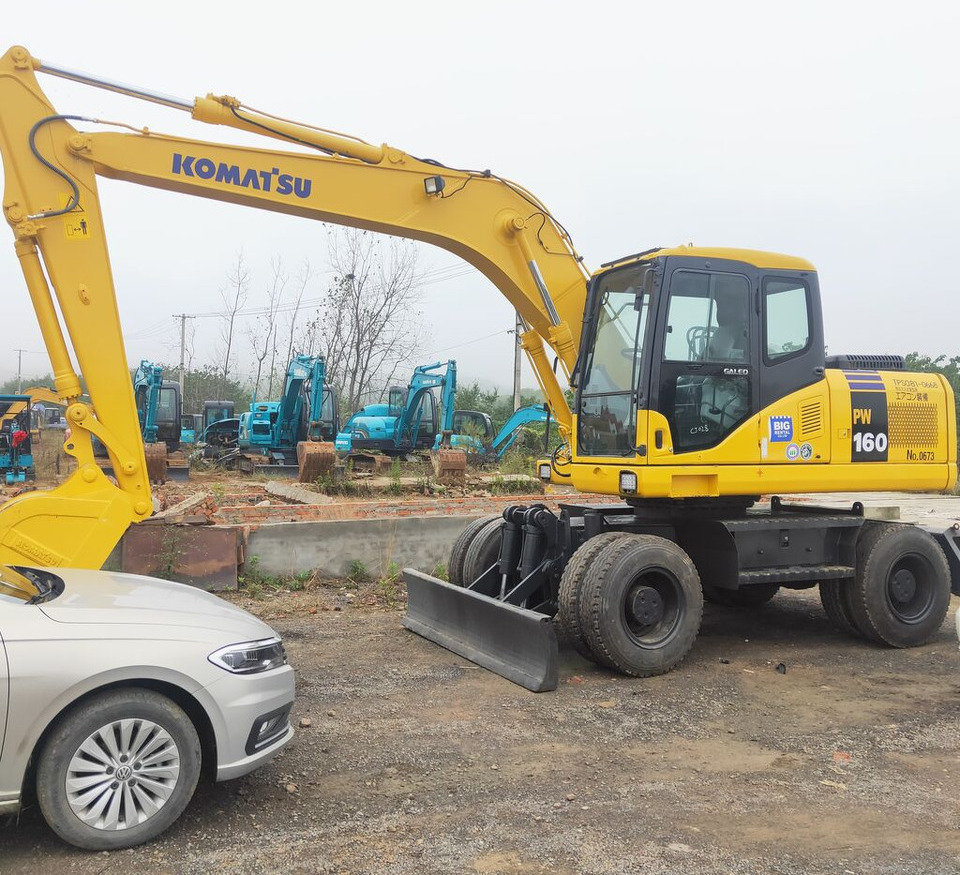Komatsu PW160 - Hjulgraver: bilde 1 Komatsu PW160 - Hjulgraver: bilde 1