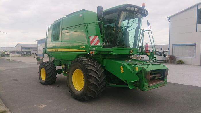 John Deere C 670 - Skurtresker: bilde 1 John Deere C 670 - Skurtresker: bilde 1