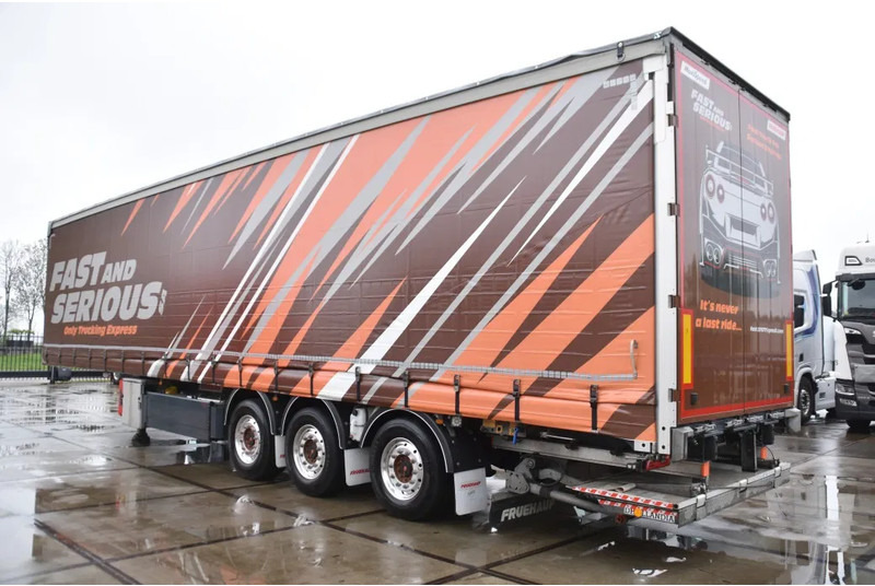 Fruehauf SLIDING CURTAINS/ROOF - TOPLIFT SYSTEM - LIFT AXLE - STEERING AXLE - SAF AXLES - ALCOA'S - DHOLLANDIA - TOP CONDITION - - Gardintrailer: bilde 4 Fruehauf SLIDING CURTAINS/ROOF - TOPLIFT SYSTEM - LIFT AXLE - STEERING AXLE - SAF AXLES - ALCOA'S - DHOLLANDIA - TOP CONDITION - - Gardintrailer: bilde 4