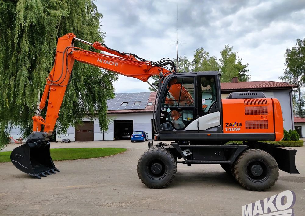Hitachi ZX 140 - Hjulgraver: bilde 1 Hitachi ZX 140 - Hjulgraver: bilde 1