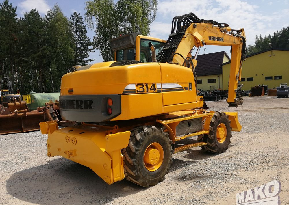 Liebherr A 314 Litronic - Hjulgraver: bilde 5 Liebherr A 314 Litronic - Hjulgraver: bilde 5