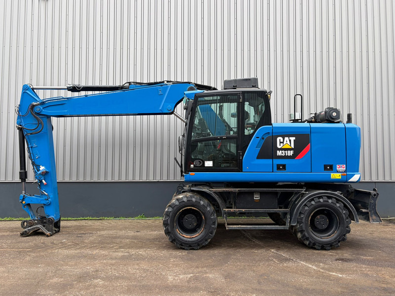 Caterpillar M318F - Hjulgraver: bilde 1 Caterpillar M318F - Hjulgraver: bilde 1
