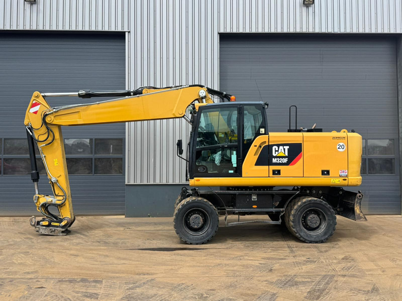 Caterpillar M320F - Hjulgraver: bilde 1 Caterpillar M320F - Hjulgraver: bilde 1