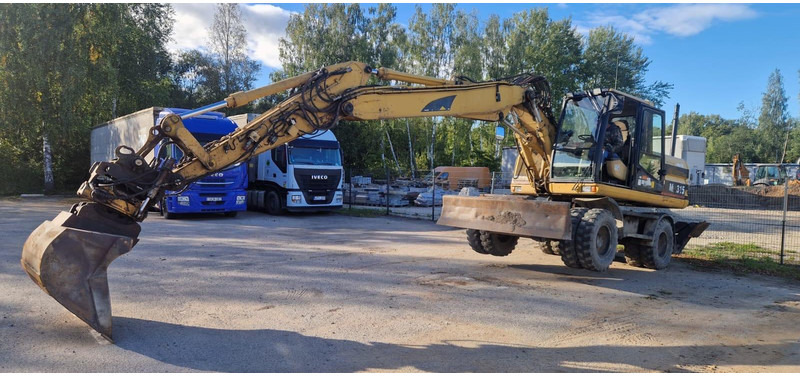 Caterpillar M 315 Rototilt - Hjulgraver: bilde 4 Caterpillar M 315 Rototilt - Hjulgraver: bilde 4