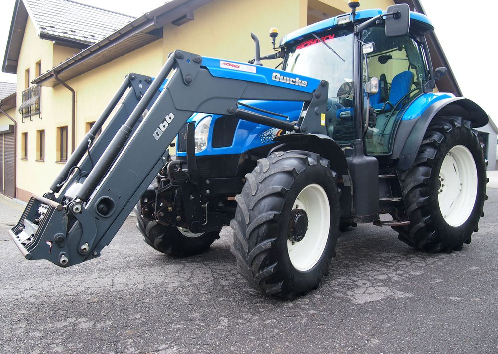 Ciągnik New Holland NH TS125A 6 cylindrów 2004 Ciągnik rolniczy New Holland TS125A - Traktor: bilde 1 Ciągnik New Holland NH TS125A 6 cylindrów 2004 Ciągnik rolniczy New Holland TS125A - Traktor: bilde 1