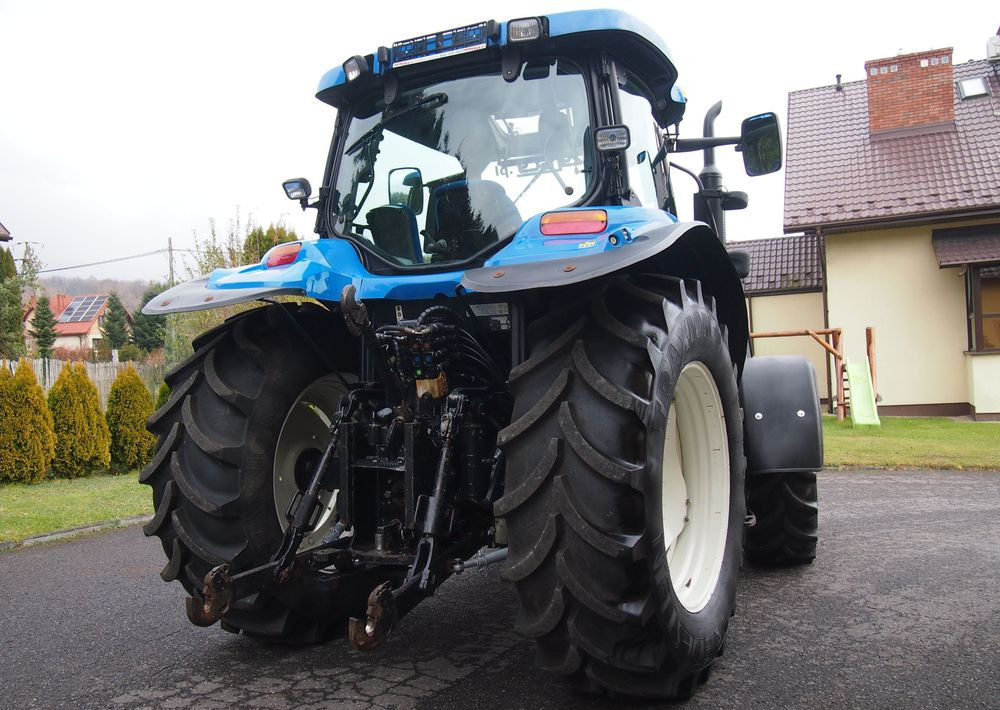 Ciągnik New Holland NH TS125A 6 cylindrów 2004 Ciągnik rolniczy New Holland TS125A - Traktor: bilde 5 Ciągnik New Holland NH TS125A 6 cylindrów 2004 Ciągnik rolniczy New Holland TS125A - Traktor: bilde 5