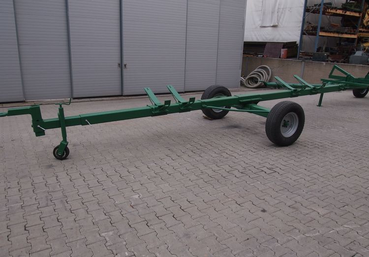 Wózek do kombajnu New Holland 4-6m Wózek pod heder New Holland , John Deere, Claas - Skjærebordsvogn: bilde 1 Wózek do kombajnu New Holland 4-6m Wózek pod heder New Holland , John Deere, Claas - Skjærebordsvogn: bilde 1