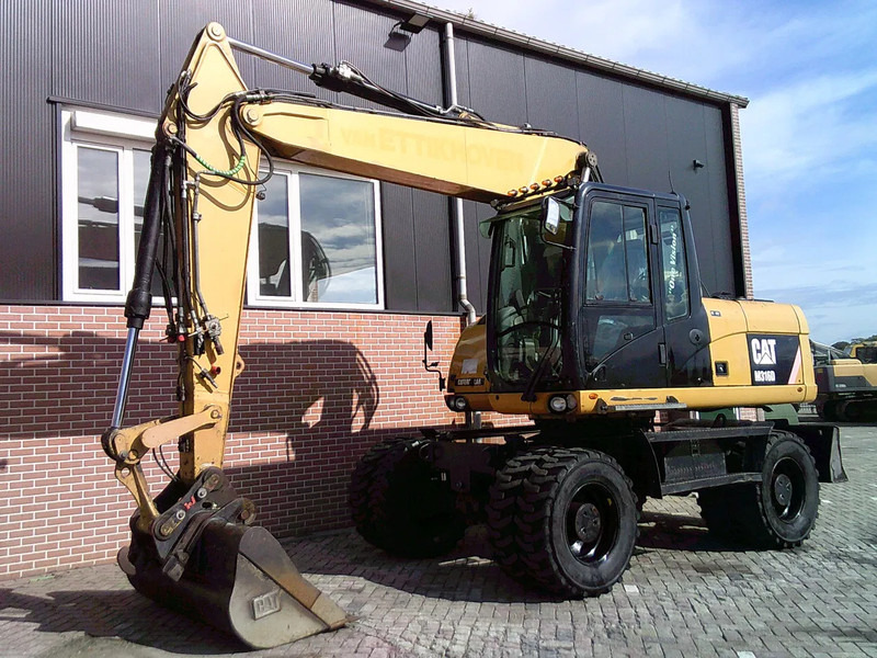 Caterpillar M316D - Hjulgraver: bilde 1 Caterpillar M316D - Hjulgraver: bilde 1