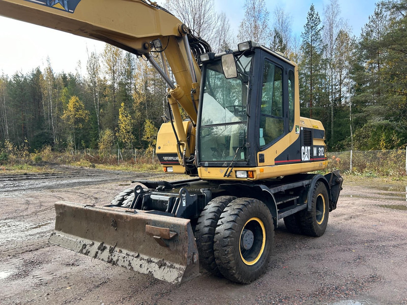 Caterpillar M312 Engcon EC20 tiltrotator - Hjulgraver: bilde 2 Caterpillar M312 Engcon EC20 tiltrotator - Hjulgraver: bilde 2
