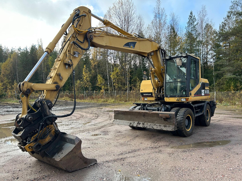 Caterpillar M312 Engcon EC20 tiltrotator - Hjulgraver: bilde 1 Caterpillar M312 Engcon EC20 tiltrotator - Hjulgraver: bilde 1