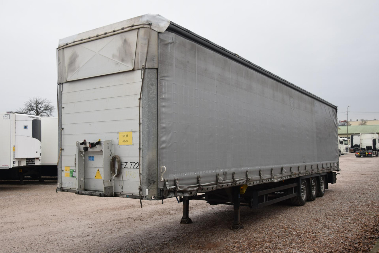 Schmitz Cargobull SCS24/L Varios - Gardintrailer: bilde 1 Schmitz Cargobull SCS24/L Varios - Gardintrailer: bilde 1