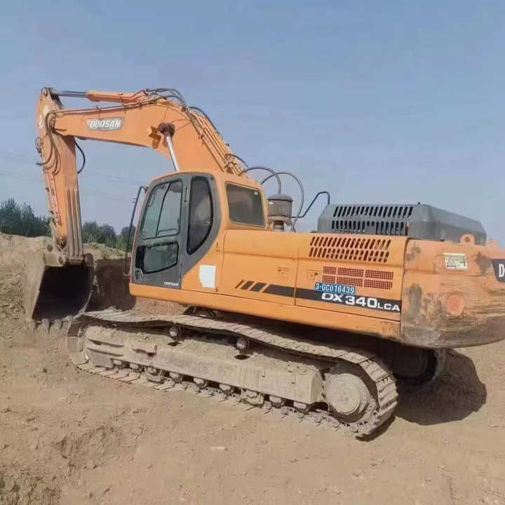 Used Original Korea Doosan 34 Ton Excavator with Cheap Price and Good Condition DOOSAN Dx340LCA Dx225 Dx330 DX360for Sale - Beltegraver: bilde 1 Used Original Korea Doosan 34 Ton Excavator with Cheap Price and Good Condition DOOSAN Dx340LCA Dx225 Dx330 DX360for Sale - Beltegraver: bilde 1