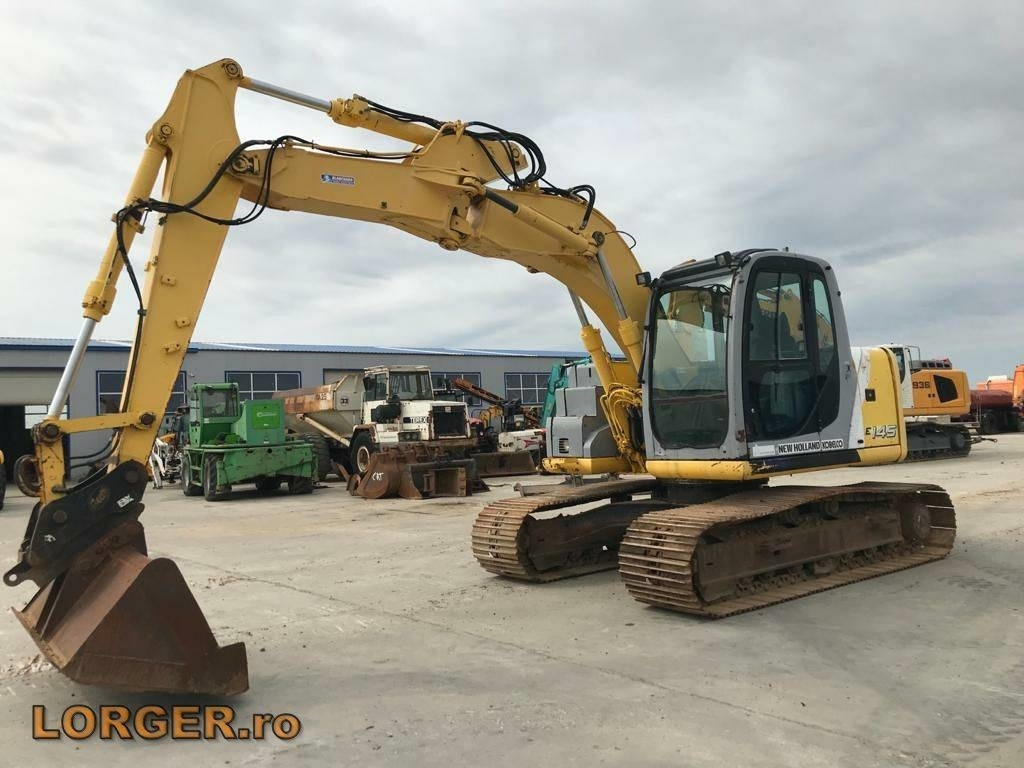 New Holland E 145 - Beltegraver: bilde 1 New Holland E 145 - Beltegraver: bilde 1