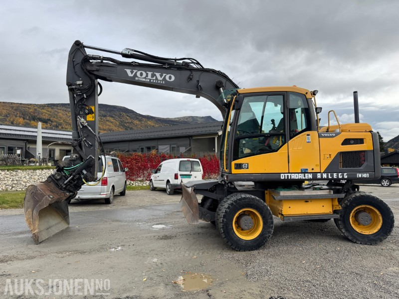 2012 Volvo EW140 D Hjulmaskin TILTROTATOR, 2 SKUFFER, SENTRALSMØRING - Gravemaskin: bilde 1 2012 Volvo EW140 D Hjulmaskin TILTROTATOR, 2 SKUFFER, SENTRALSMØRING - Gravemaskin: bilde 1