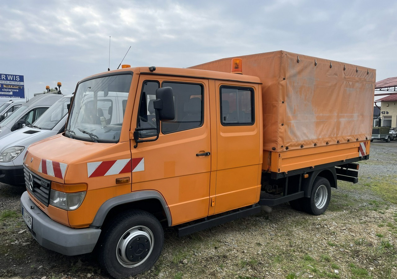 Mercedes-Benz Inny Mercedes-Benz Vario 614 Brygadówka skrzynia plandeka 6-oso doka dokka 2004 - Kapellbil: bilde 1 Mercedes-Benz Inny Mercedes-Benz Vario 614 Brygadówka skrzynia plandeka 6-oso doka dokka 2004 - Kapellbil: bilde 1