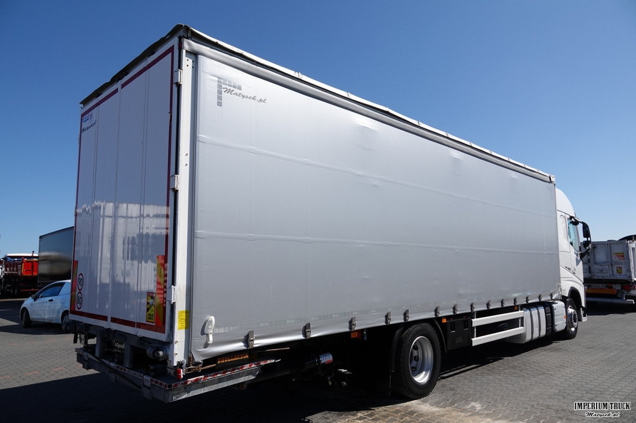 VOLVO FH 420 / 4x2 / SOLÓWKA / FIRANKA 9.10 M / KLIMA POSTOJOWA / WINDA DHOLLANDIA 2000KG / PO KONTRAKCIE SERWISOWYM - Kapellbil: bilde 5 VOLVO FH 420 / 4x2 / SOLÓWKA / FIRANKA 9.10 M / KLIMA POSTOJOWA / WINDA DHOLLANDIA 2000KG / PO KONTRAKCIE SERWISOWYM - Kapellbil: bilde 5