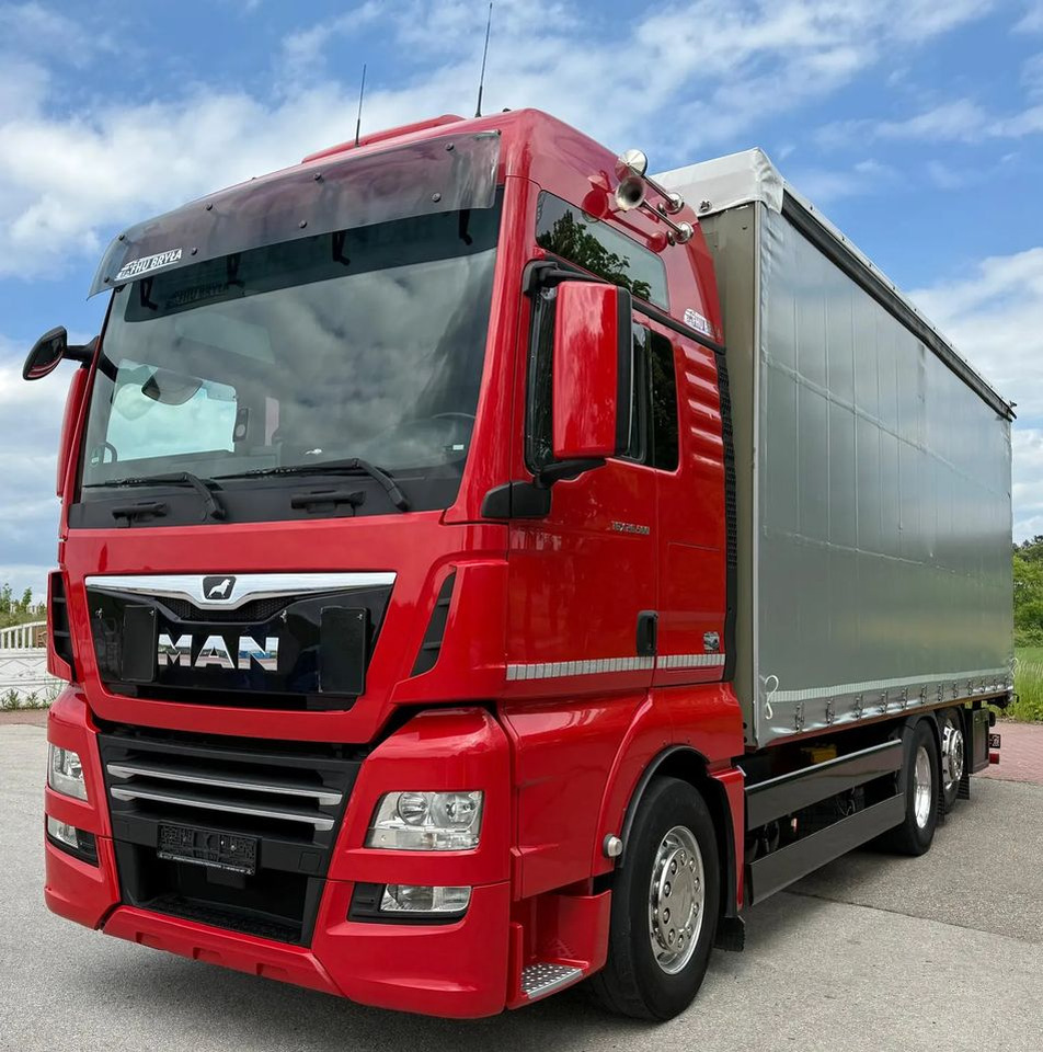 MAN TGX 26.500 / LIFT / 6X2 / KLIMA POSTOJOWA / 18PALET / E6 / FIRANKA / 18 TON ŁADOWNOŚĆ / WINDA / NISKI PRZEBIEG / JEDEN WŁAŚCICIEL / PODWIESZANA OŚ - Kapellbil: bilde 1 MAN TGX 26.500 / LIFT / 6X2 / KLIMA POSTOJOWA / 18PALET / E6 / FIRANKA / 18 TON ŁADOWNOŚĆ / WINDA / NISKI PRZEBIEG / JEDEN WŁAŚCICIEL / PODWIESZANA OŚ - Kapellbil: bilde 1