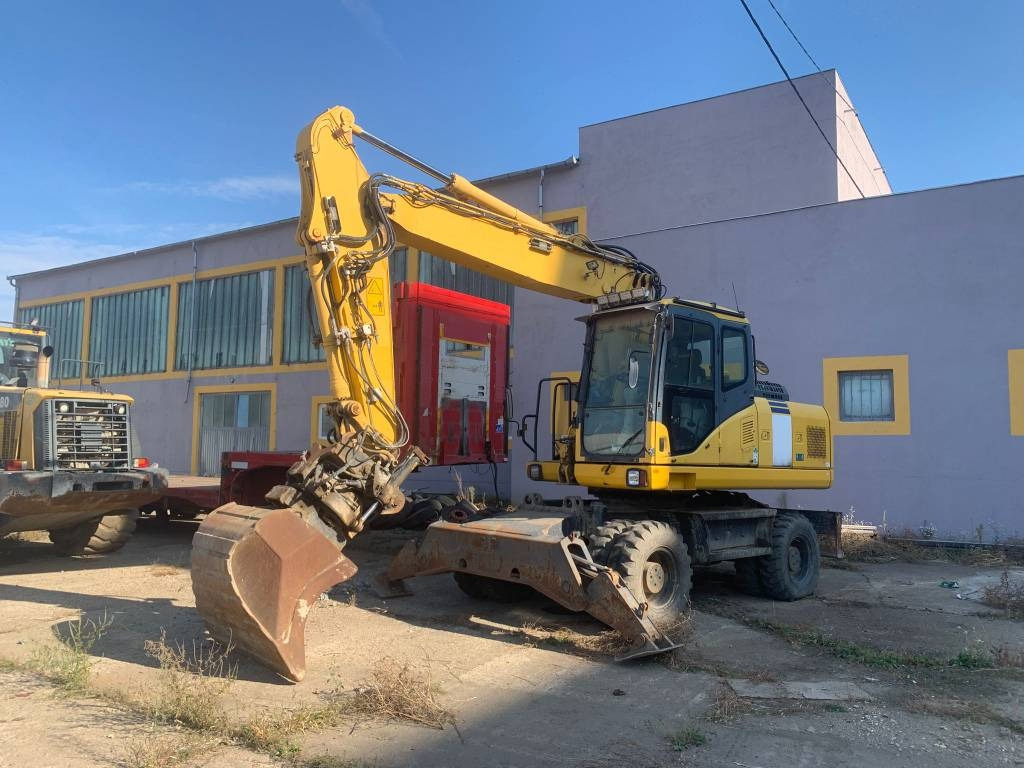 Komatsu PW180-E0+Engcon Rototilt - Hjulgraver: bilde 1 Komatsu PW180-E0+Engcon Rototilt - Hjulgraver: bilde 1