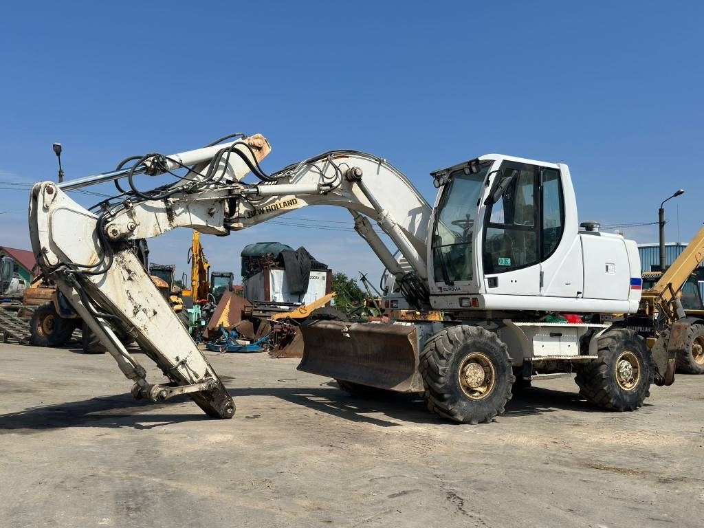 New Holland MH Plus - Hjulgraver: bilde 2 New Holland MH Plus - Hjulgraver: bilde 2