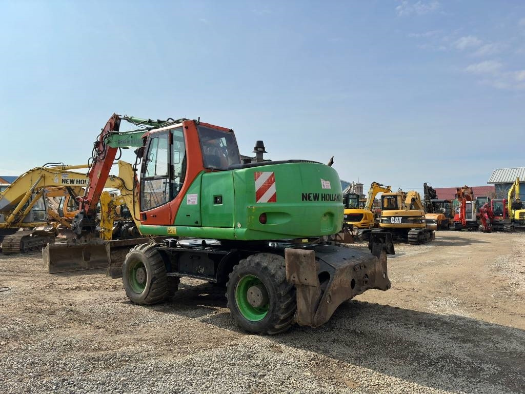 New Holland MH Plus - Hjulgraver: bilde 5 New Holland MH Plus - Hjulgraver: bilde 5
