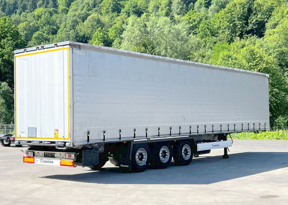 Krone Firanka Coilmulde // 9m // Alu Drzwi // Ażury // Oś podnoszona // - Gardintrailer: bilde 1 Krone Firanka Coilmulde // 9m // Alu Drzwi // Ażury // Oś podnoszona // - Gardintrailer: bilde 1