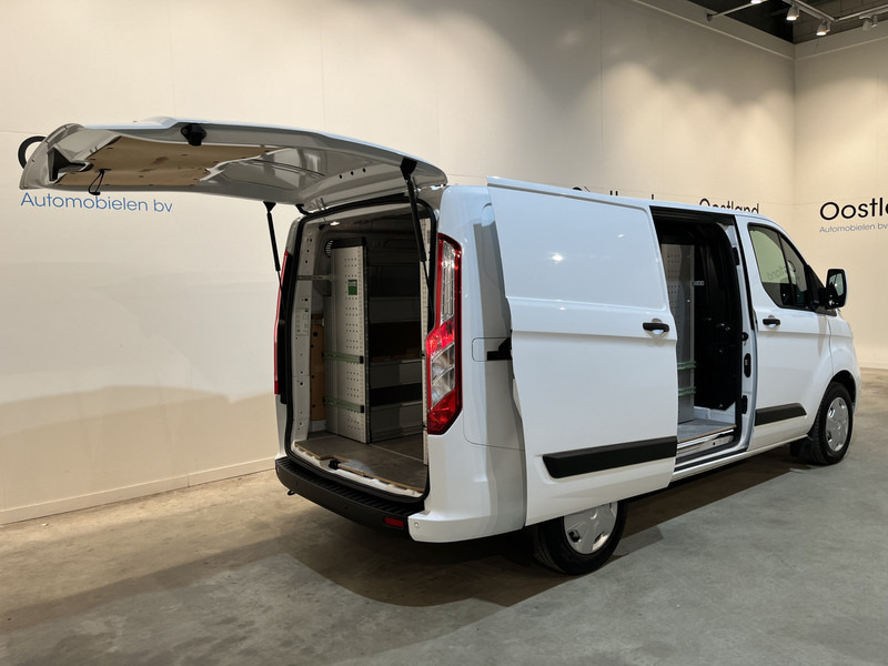 Ford Transit Custom 300 2.0 TDCI L1H1 Trend 130 PK / Servicebus / Bott Inrichting / Euro 6 / Schuifdeur L + R / Airco / CarPlay / Klep / PDC / Navigatie / 3-Zits / BPM VRIJ !! - Små varebil: bilde 2 Ford Transit Custom 300 2.0 TDCI L1H1 Trend 130 PK / Servicebus / Bott Inrichting / Euro 6 / Schuifdeur L + R / Airco / CarPlay / Klep / PDC / Navigatie / 3-Zits / BPM VRIJ !! - Små varebil: bilde 2