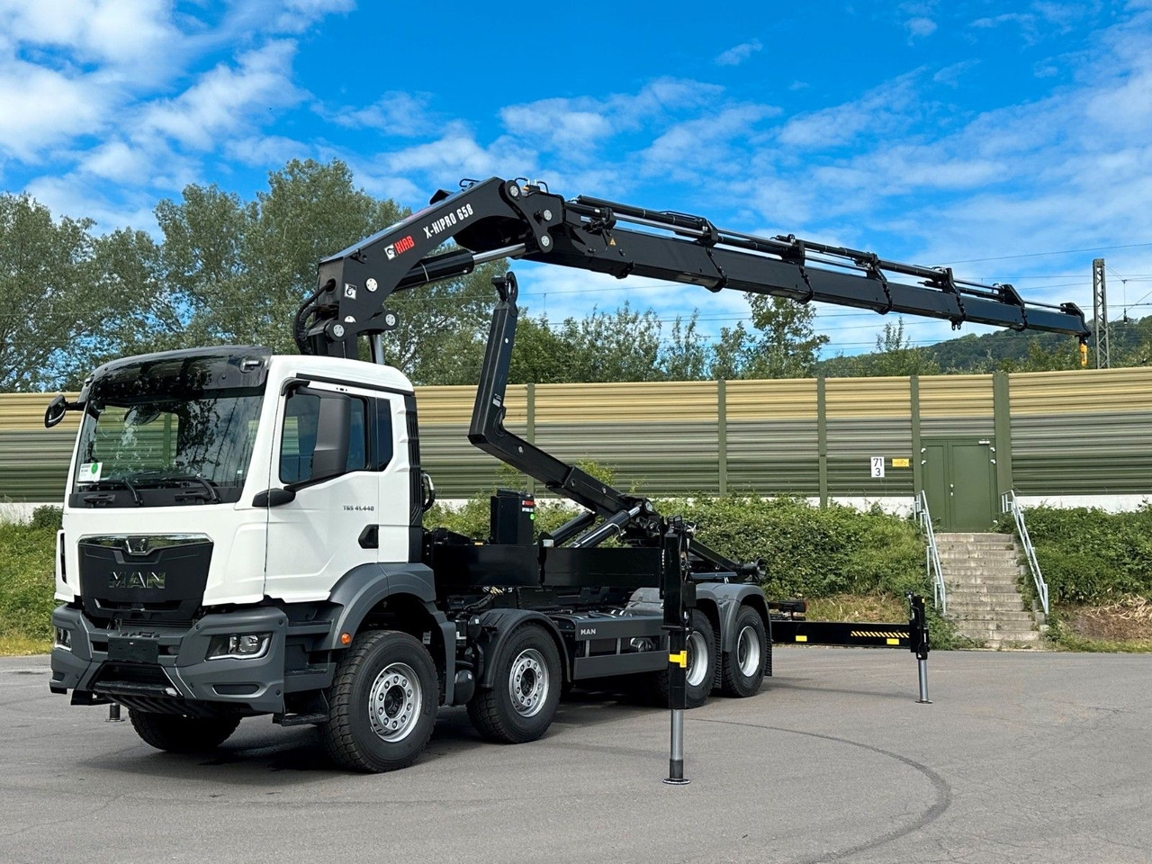 MAN TGS 35.520 8x4 Abrollkipper + Kran HIAB 658E6 - Krokbil, Kranbil: bilde 1 MAN TGS 35.520 8x4 Abrollkipper + Kran HIAB 658E6 - Krokbil, Kranbil: bilde 1